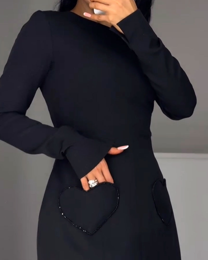 Elegancka sukienka z długim rękawem i ściągaczem w talii